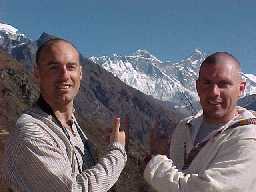 Greg and Mark pointing at Mount Everest (centre)